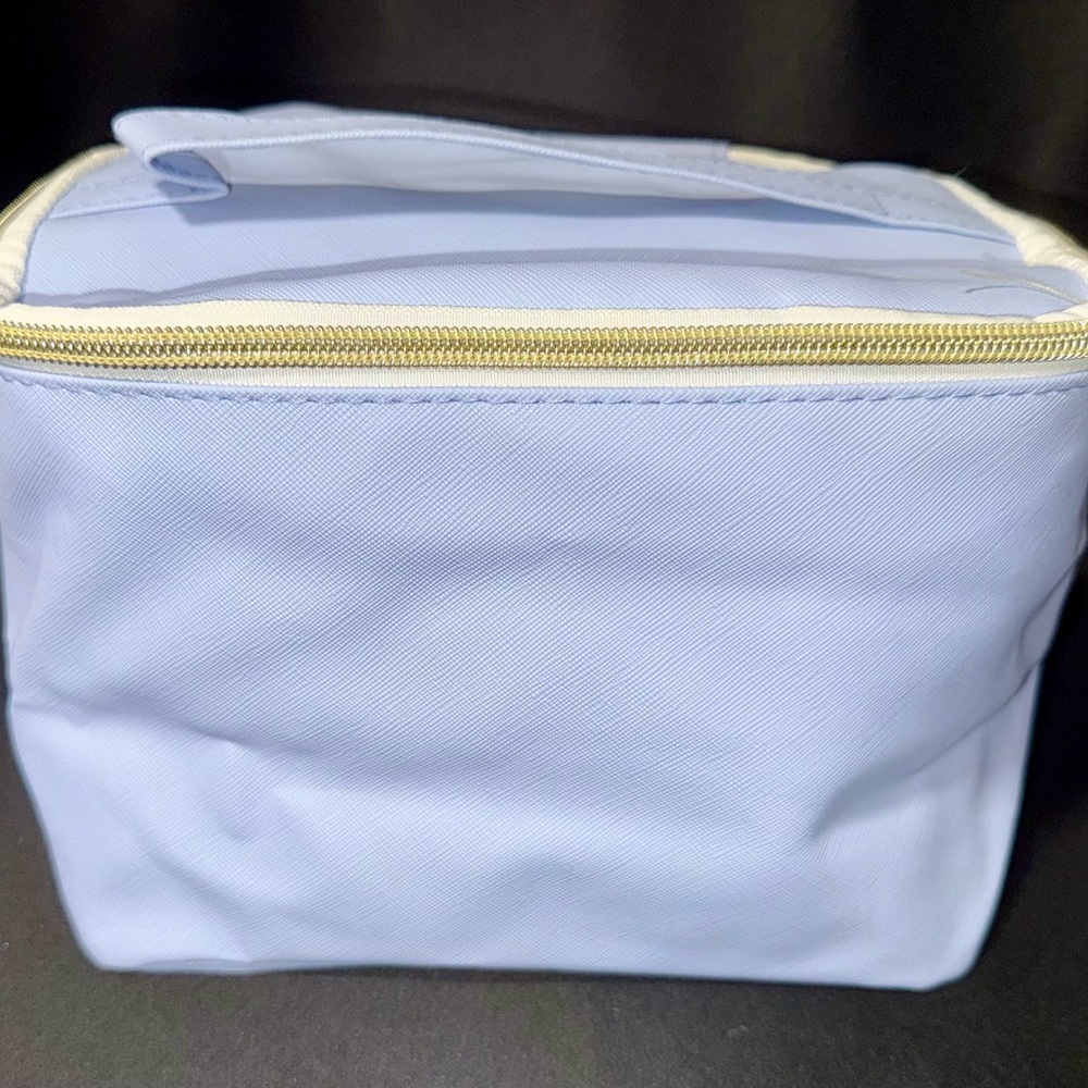 Light Blue Cosmetic Bag with Cream Accents